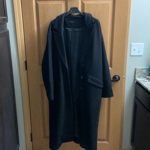 Universal Standard Willow Cocoon Oversized Coat in Black.